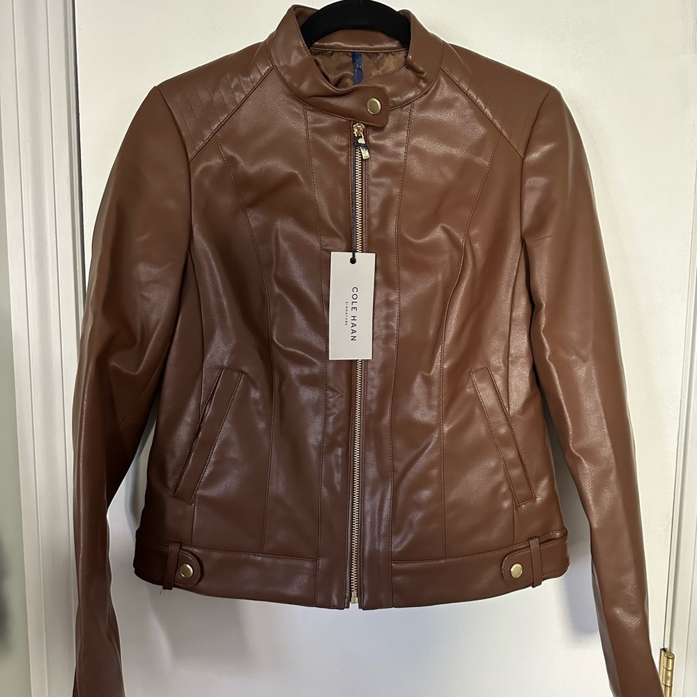Brown Cole Haan jacket.